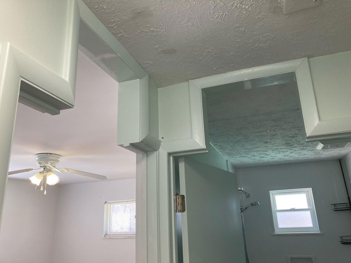 Cutouts Above All Doors In House. They Are Finished And Doors Don’t Extend Into The Cutout. No Holes Or Other Indicators Of Something Being Mounted On The Ceiling