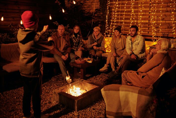 Group Of Friends Playing Charades 