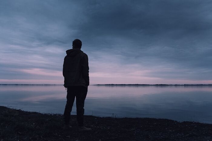 man standing on the shore 