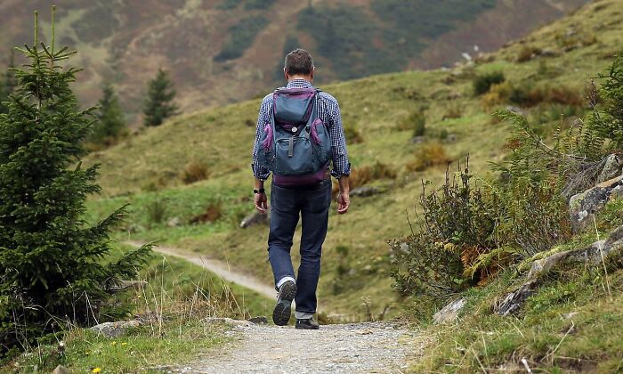 man carrying a backpack 